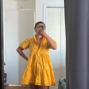 Yellow dress with flower embroidery